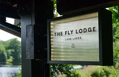 Fly Lodge Sign